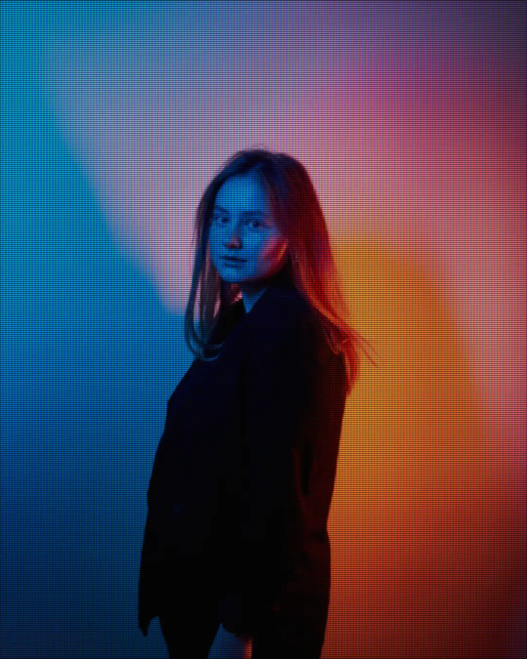 A neon-lit portrait on a studio PVM's tight aperture grille — PVM / BVM